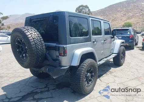 2013 Jeep Wrangler Unlimited Sahara z USA, uszkodzony, nr VIN 1C4BJWEG6DL539208